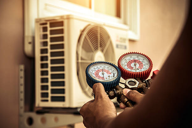 Professional Hvac technician working in Delco, NC